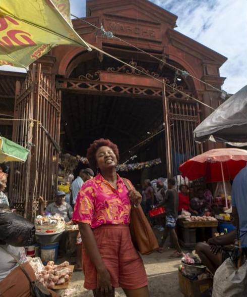 Woman at the Cap-Haïtien market entrance